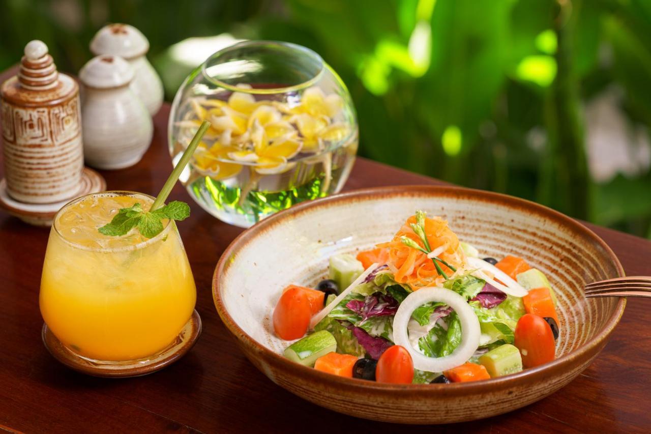 Shintana Saya La Maison Siem Reap Exterior photo A salad with a glass of lemonade
